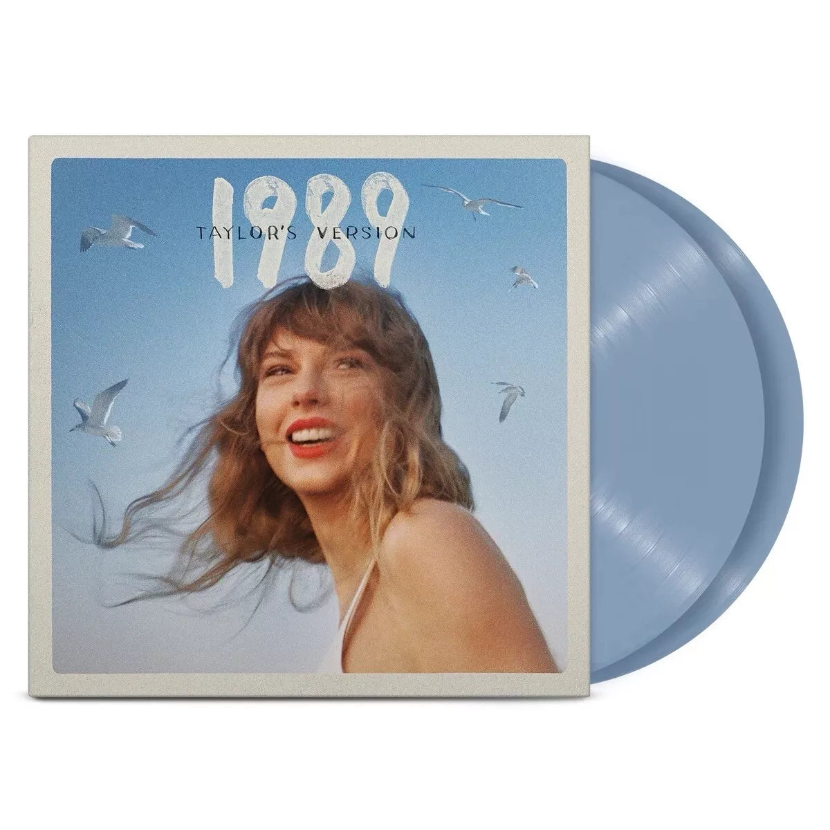 Portada del vinilo 1989 (Taylor's Version) de Taylor Swift; la cantante sonríe sobre un cielo azul con gaviotas y el título del álbum en tipografía blanca.